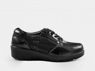 Zapato de línea deportiva en combinación de  pieles grabadas, con cordón y cremallera Comfort